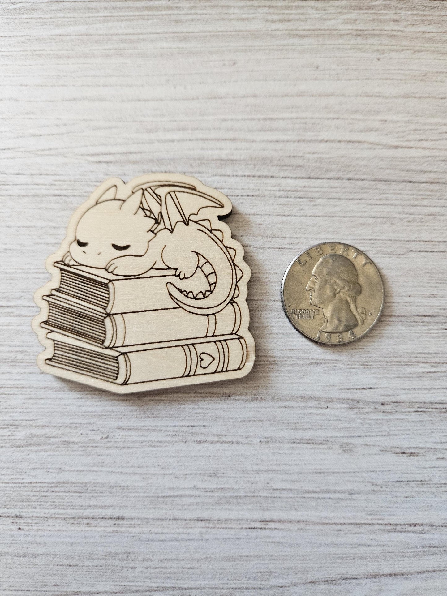 Baby Dragon Sleeping On Books