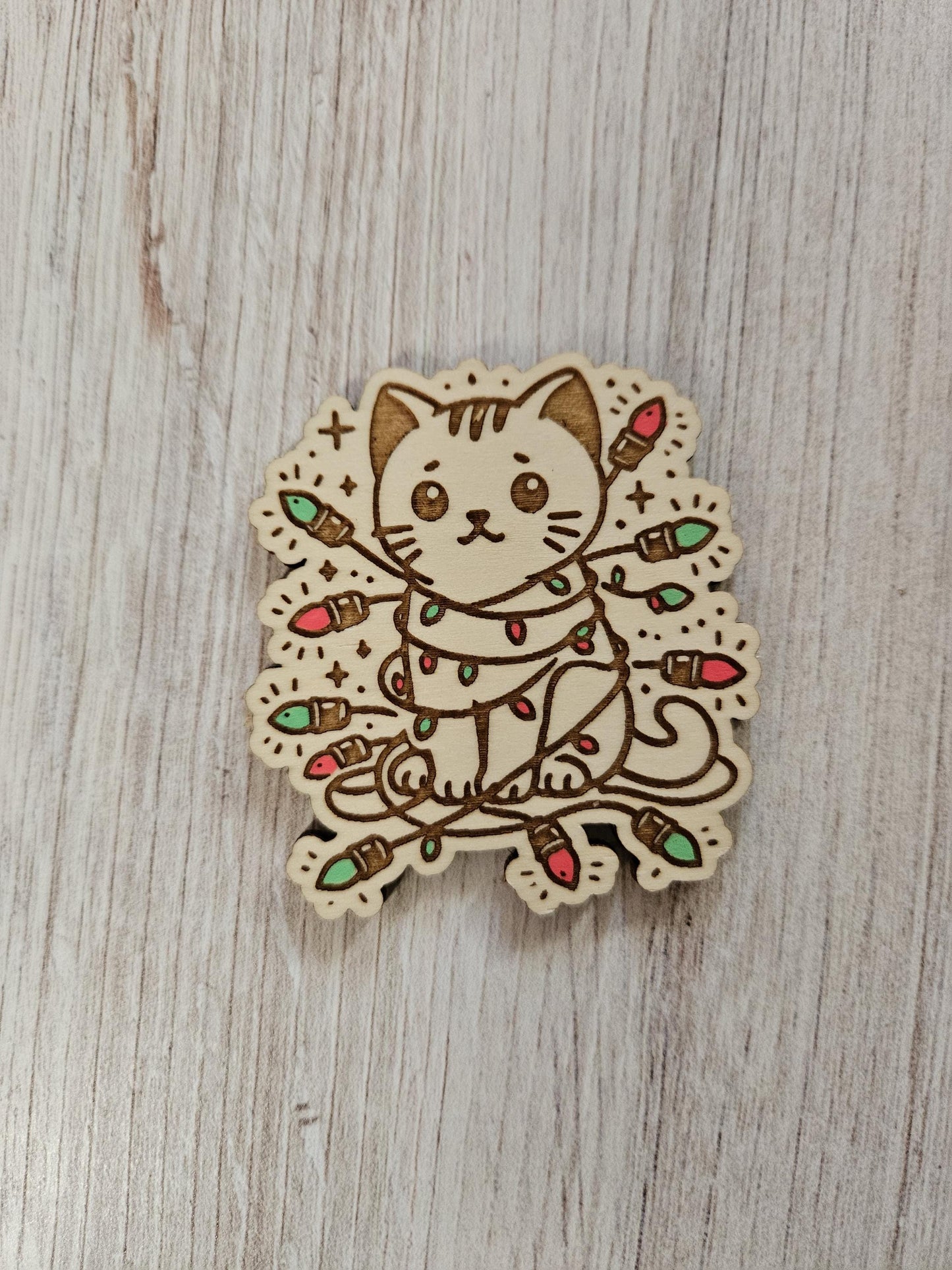 Cat Wrapped In Christmas Lights Needle Cover Minder