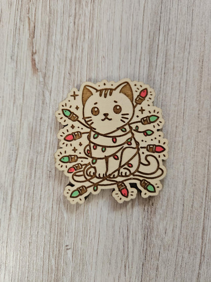 Cat Wrapped In Christmas Lights Needle Cover Minder