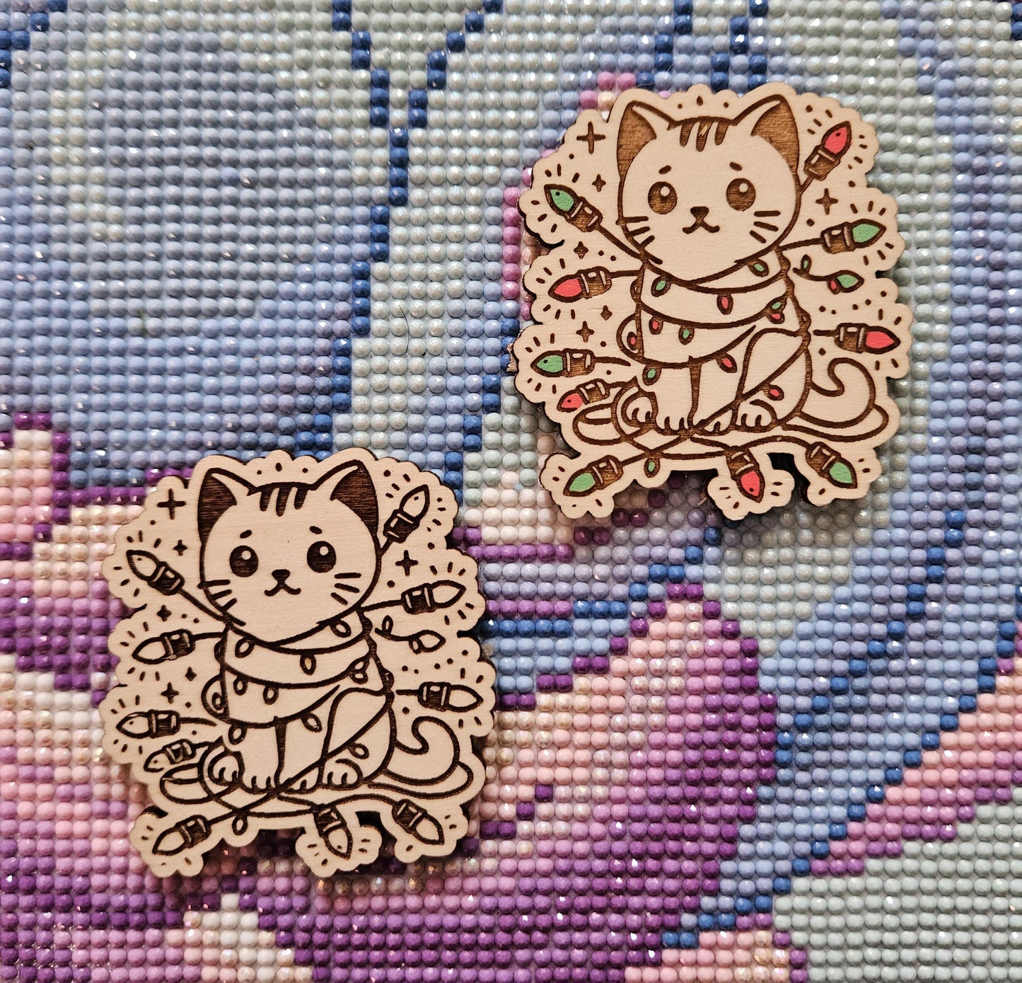 Cat Wrapped In Christmas Lights Needle Cover Minder