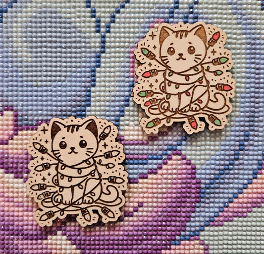 Cat Wrapped In Christmas Lights Needle Cover Minder