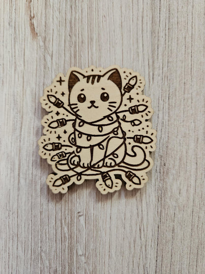 Cat Wrapped In Christmas Lights Needle Cover Minder