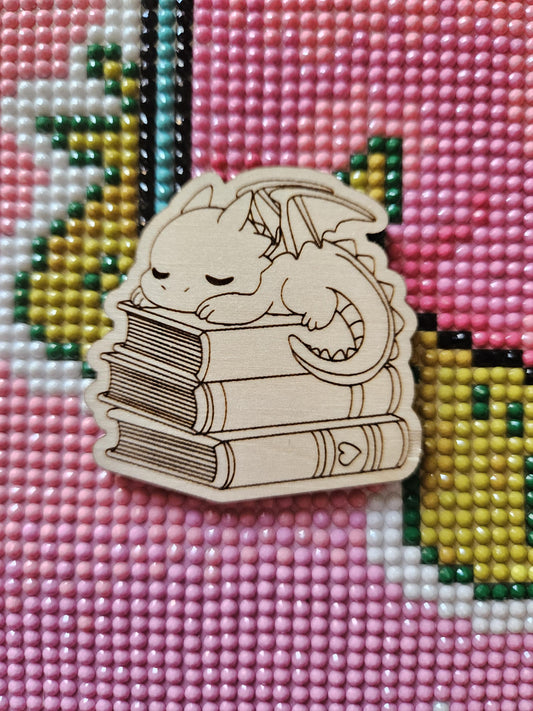 Baby Dragon Sleeping On Books
