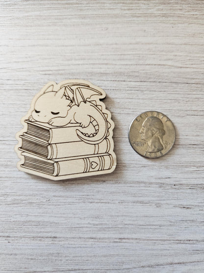 Baby Dragon Sleeping On Books
