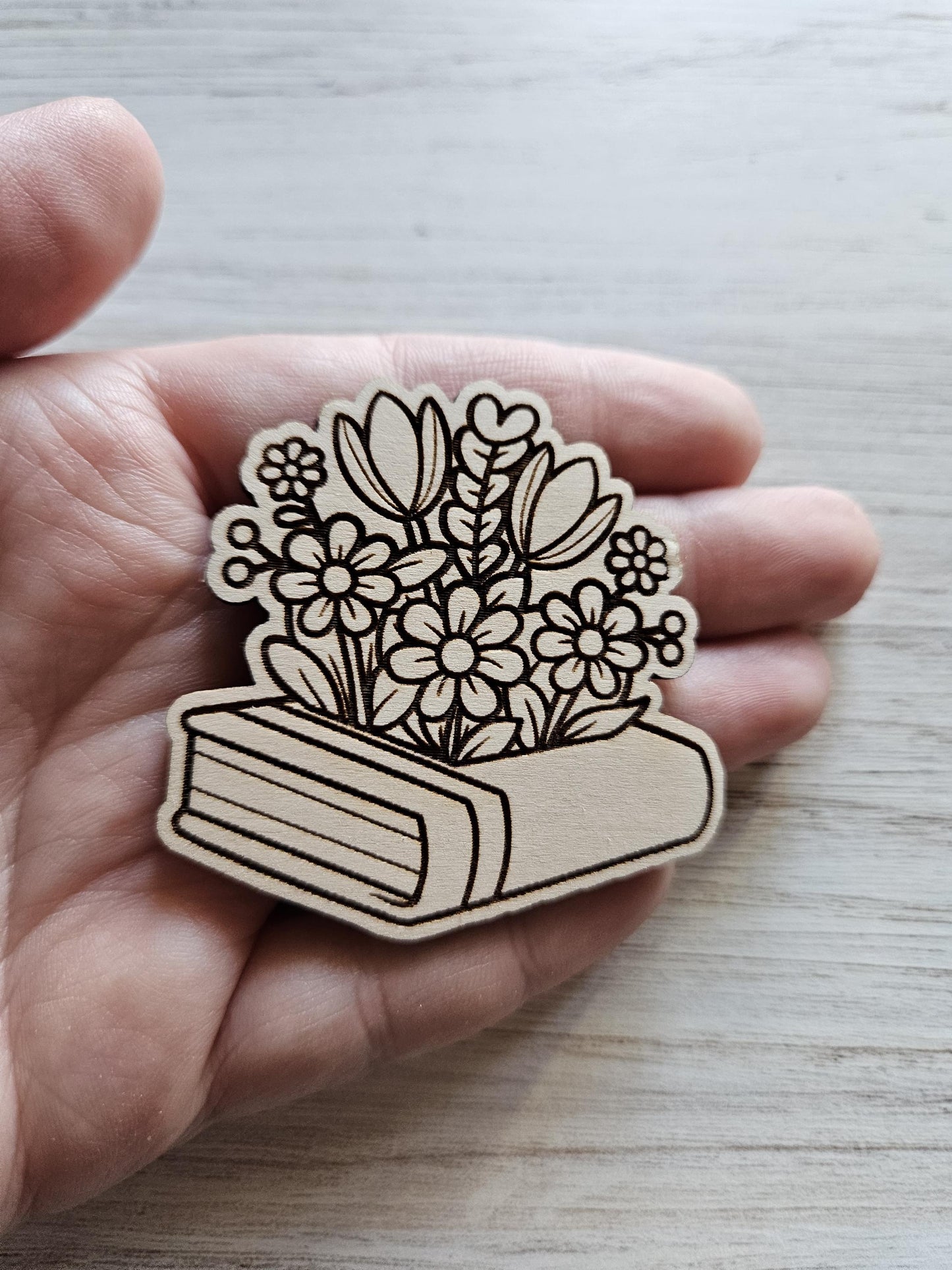 Flowers Blooming From Book