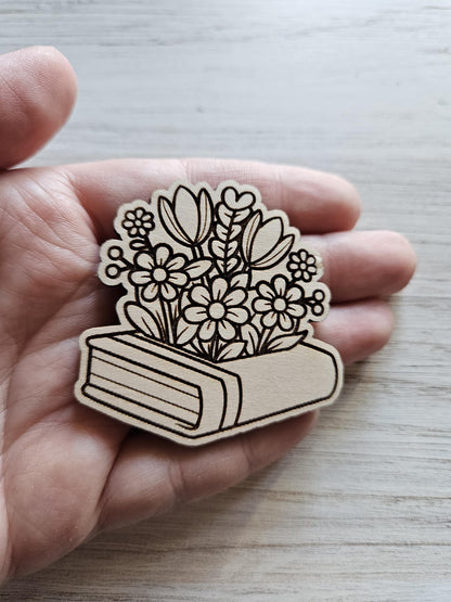 Flowers Blooming From Book