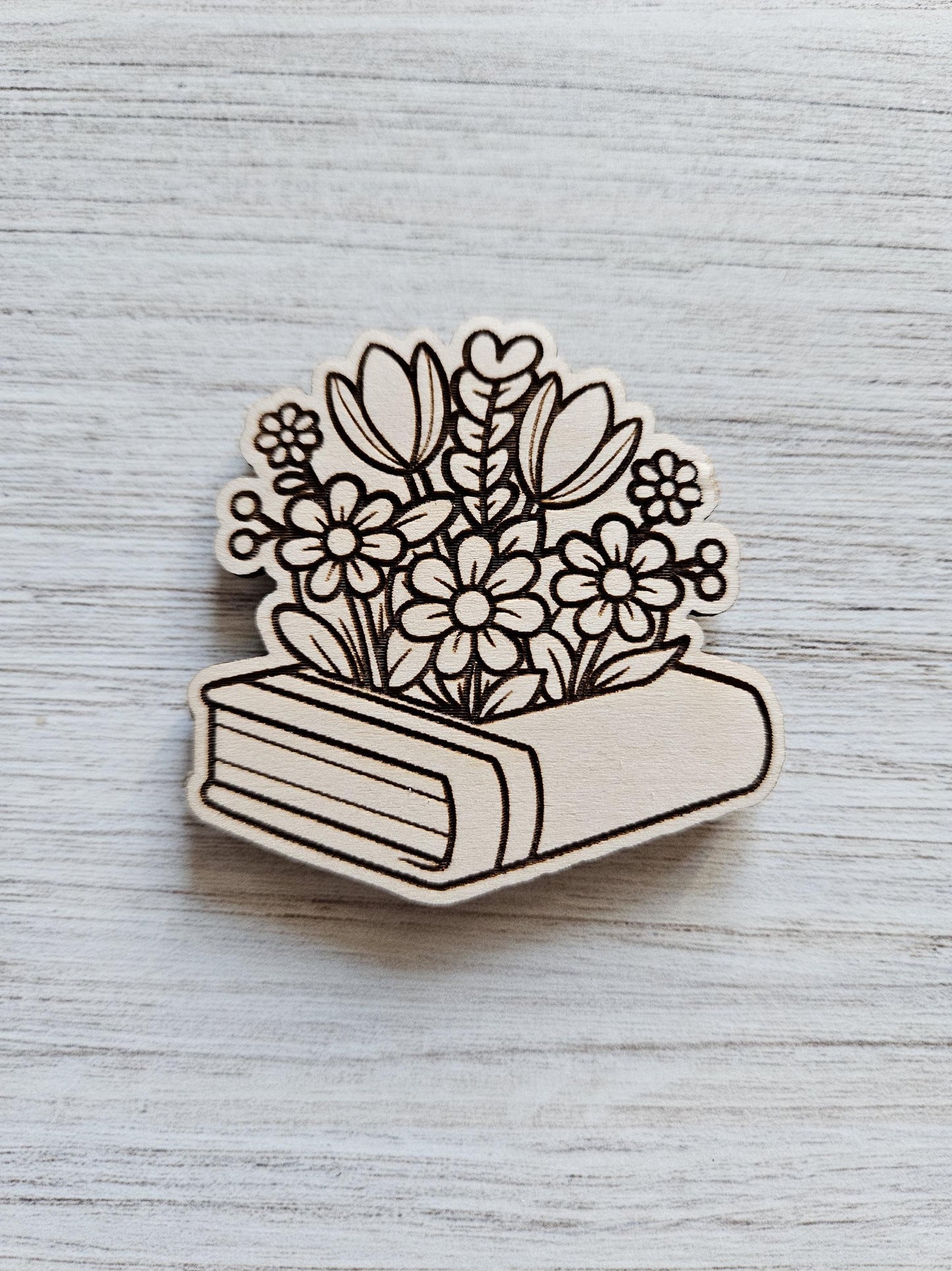 Flowers Blooming From Book