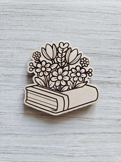 Flowers Blooming From Book